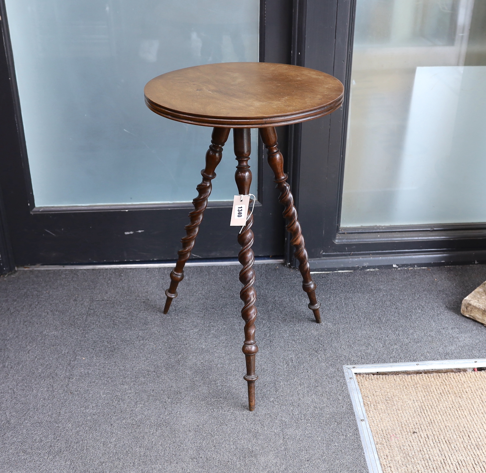 A Victorian mahogany circular 'Gypsy' tripod table, diameter 43cm, height 68cm